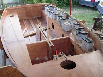 Port seat weighted